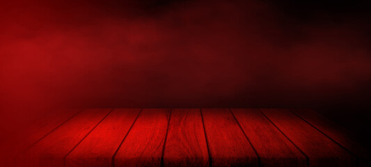 Wall Mural - empty space of wooden table with smoke and red effect lighting in dark background.