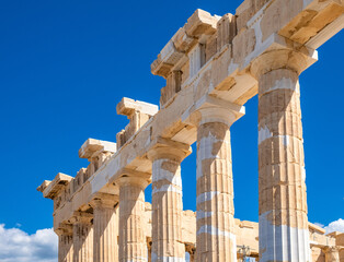 Panoramic view of Parthenon - temple of goddess Athena - within ancient Athenian Acropolis complex atop Acropolis hill in Athens, Greece