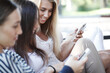 © alotofpeople - Girls with their smartphones
