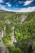 Škocjan caves Slovenia church Reka river water stream waterfall green spring foliage