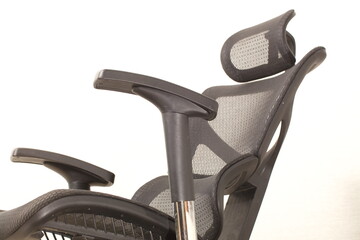 Wall Mural - office ergonomic chair with mesh coating.