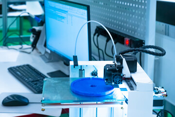 Poster - Modern printing technologies. 3d printer on a computer background. Printing three-dimensional objects. Creating three-dimensional models of objects. Layer-by-layer printing of items of polymer threads