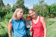 © amelie - Baby girl with mother and grandmother in the garden
