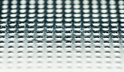 macro with defocus, photographs of the embossed texture of a flat watch battery, iron, pimpy, scratched texture of an old, vintage battery