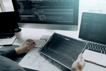 asian man working code program developer computer web development working design software on desk in