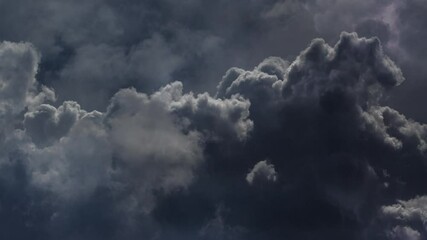 black cloud with a bolt of lightning in it