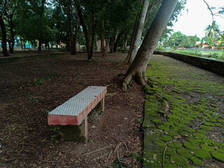 brick sitting chairs in a city park