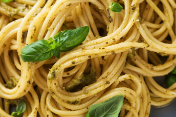 Canvas Print - Pasta with pesto sauce and basil.