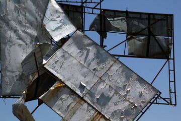 broken abandoned promotion sign detail