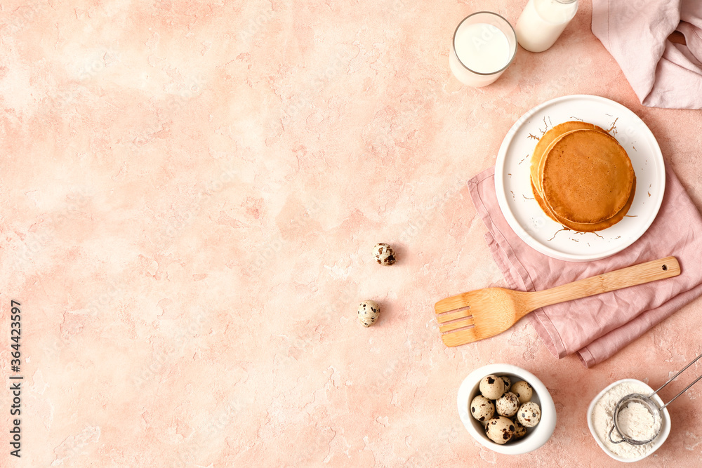 Tasty pancakes with ingredients on color background