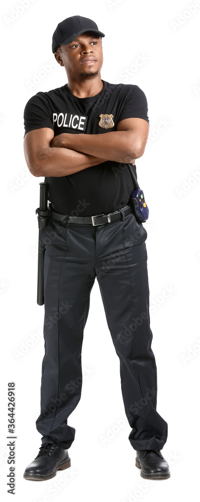 Aggressive African-American police officer on white background