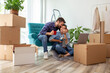 © Impact Photography - Couple searching for apartment redecoration ideas