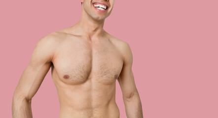 Young man with good naked torso body similing