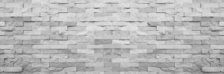 Wall Mural - Grey aged natural sand stone walling for texture and design background