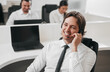 © kegfire - Help line agent answering call in office