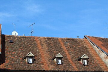 Sticker - Building's roof covered in the red clay roof tiles