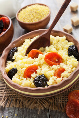 Wall Mural - Millet porridge with dried fruits