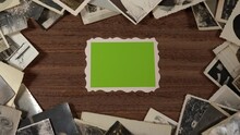 Closeup Top View 4k Video Of Old Vintage Paper Pictures Isolated On Brown Wooden Table Background