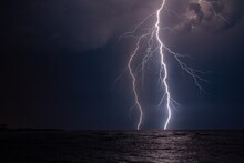 Scenery Of Lightning Over The Stormy Sea At Night