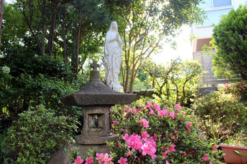 Statue of Virgin Mary with a Japanese toro, in a Salesian Nunnery