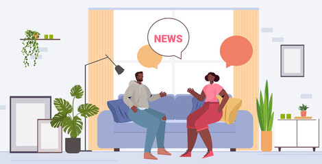 african american couple discussing daily news spending time together chat bubble communication concept man woman sitting on sofa living room interior full length vector illustration