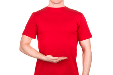 Canvas Print - Man in red t-shirt holding something on his palm isolated white background