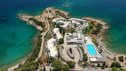 Aerial drone photo of famous seaside chapel of Agios Aimilianos in resort area, Porto Heli, Argolida, Peloponnese, Greece