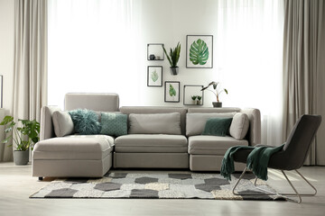 Wall Mural - Comfortable large sofa in light room. Interior design