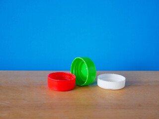 close up of plastic bottle caps.