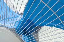 Cropped Image Of The Blue Fan. Air Blower. View Of Electrical Outdoor Fan A Blue Background. Ventilator. 