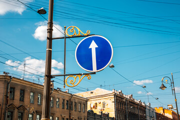 Arrow sign with old buildings in Saint Petersburg, Russia