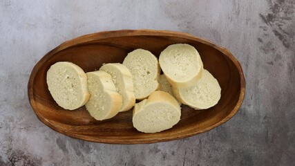 Wall Mural - Serving a Bowl of Sliced Bread