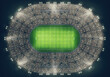 Top view of a soccer stadium full of people during a night game . 3D Rendering
