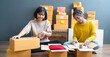 © sutthinon602 - Startup small business owner working with computer at workplace. Freelance two woman seller check product order. Packing goods for delivery to customer. Online selling. E-commerce. Online Shopping