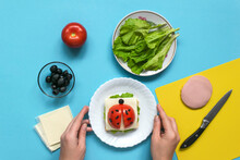 Funny Sandwich For Children In Form Of Ladybug Made Of Fresh Tomato, Salad, Cheese, Sausage, Bacon And Bread On Blue Background. Instruction How To Make Creative Food Art Breakfast For Kids.