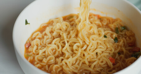 Spicy instant noodle in bowl