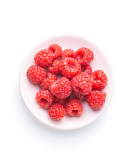 Wall Mural - Ripe red raspberries on plate