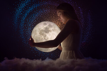 Wall Mural - sensitivity and the universe, astrology and space, a girl holding the moon in her hands, fairy tale 