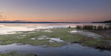 Fototapeta Pomosty - Panorama Sunset and soft shades pf pink and green over the Lake