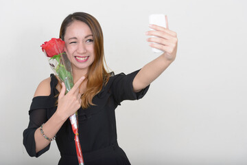 Wall Mural - Portrait of young beautiful Asian woman ready for Valentine's day