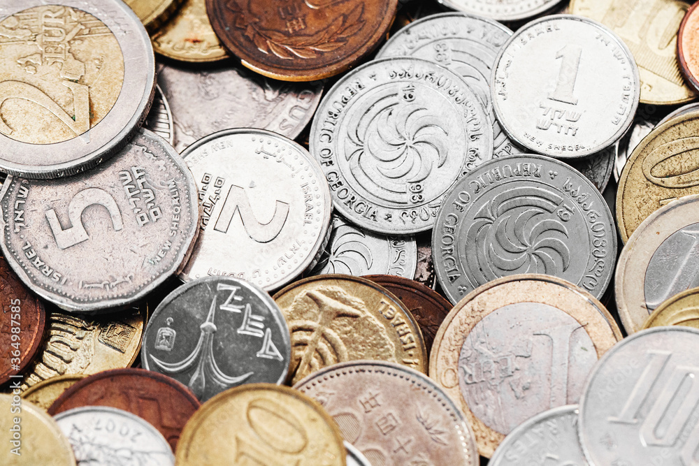 different-currency-coins-stacked-pile-of-money-metal-coins-texture