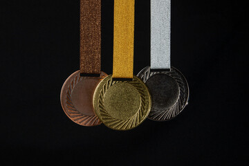 Gold medal, silver medal and bronze medal concept for winning or success