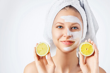 Wall Mural - cosmetology, skin care, face treatment, spa and natural beauty concept. woman with facial mask holds