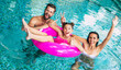 © My Ocean studio - Excited and young happy family on vacation in the spa hotel are relaxing and have fun in the swimming pool. Summer rest