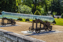 Historic Napoleonic Artillery Gun Near Les Invalides In Paris. Les Invalides (National Residence Of Invalids) Is A Complex Of Museums And Monuments Relating To Military History Of France.