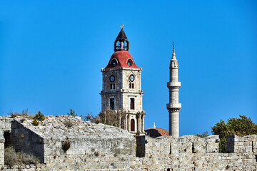 Poster - Stone Tower and Turkish minaret behind the medieval defensive wall