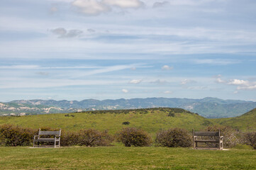 Social distancing – two benches on a safe distance in outdoor park