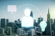 © Pixels Hunter - Double exposure of social network icons hologram on San Francisco office buildings background. Networking concept