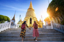 Two Asian Girlfriends Traveling And Check Location By A Map In Grand Palace And Wat Phra Kaew Bangkok City,Thailand