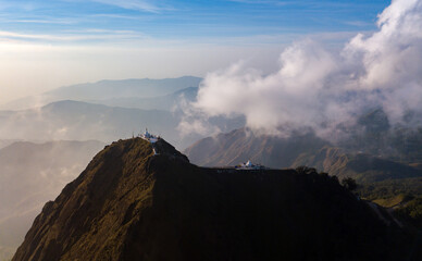 Top View Mulayit Taung golden light of the morning sun and the mist covered on Mount Mulayit,Myanmar